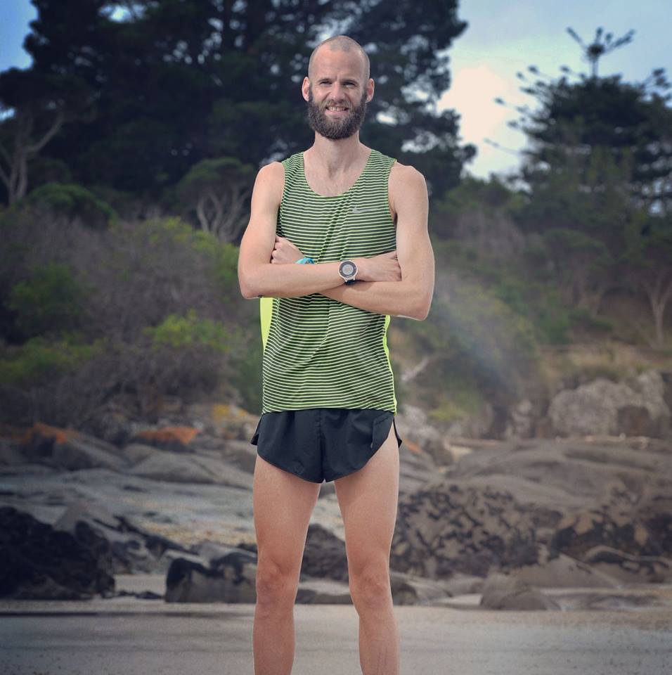 A Sportsman On The Floor With Nature In His Back